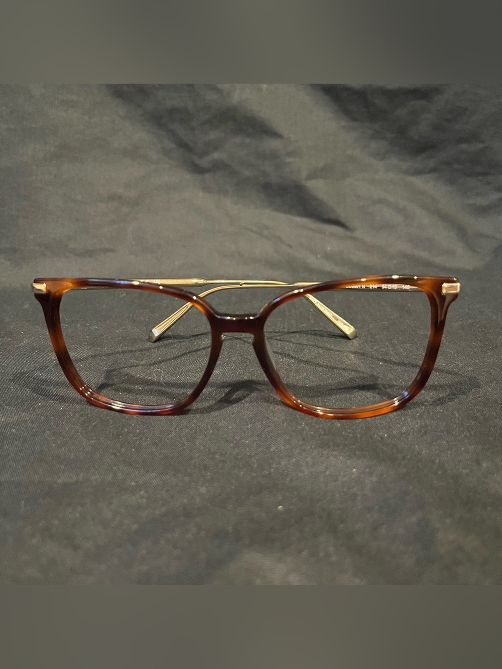 Longchamp Tortoiseshell Eyeglass Frames with Metal Arms - Classic Style
